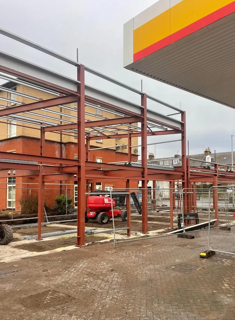 Steel framework during Shell garage construction